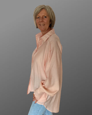 lange blouse met elastische pofmouw in perzikroze