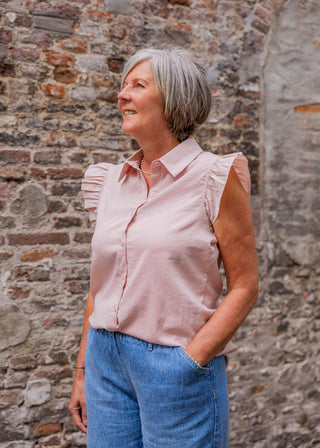 roze blouse met korte pofmouwen