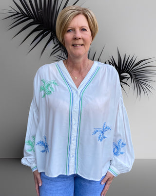 Witte blouse met borduursel in groen/blauw