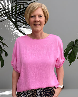 Top met korte elastische mouw in roze