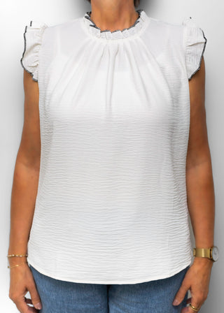 witte structuur top met rafel details