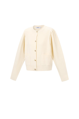Gebreid vest met pofmouw en "bloem"knopen in beige